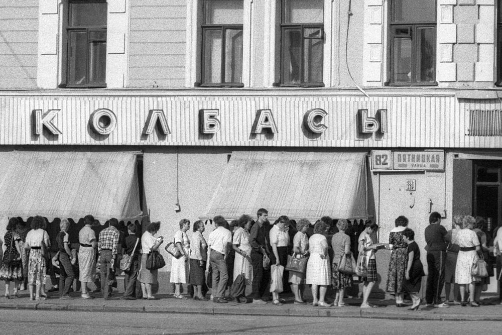 People in line in old photo.