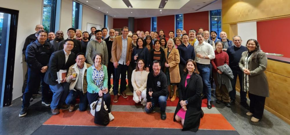 The faculty and staff of the School of Computer Science, gathered around Joachim Gudmundsson