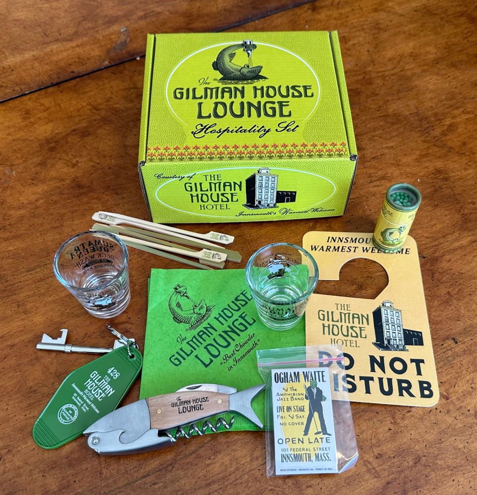 The contents of the Gilman House Lounge Hospitality Set spread out on a table.