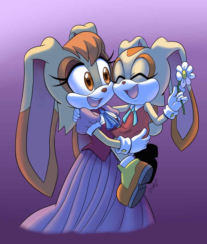 Vanilla holds her daughter Cream who’s giving her a white flower 