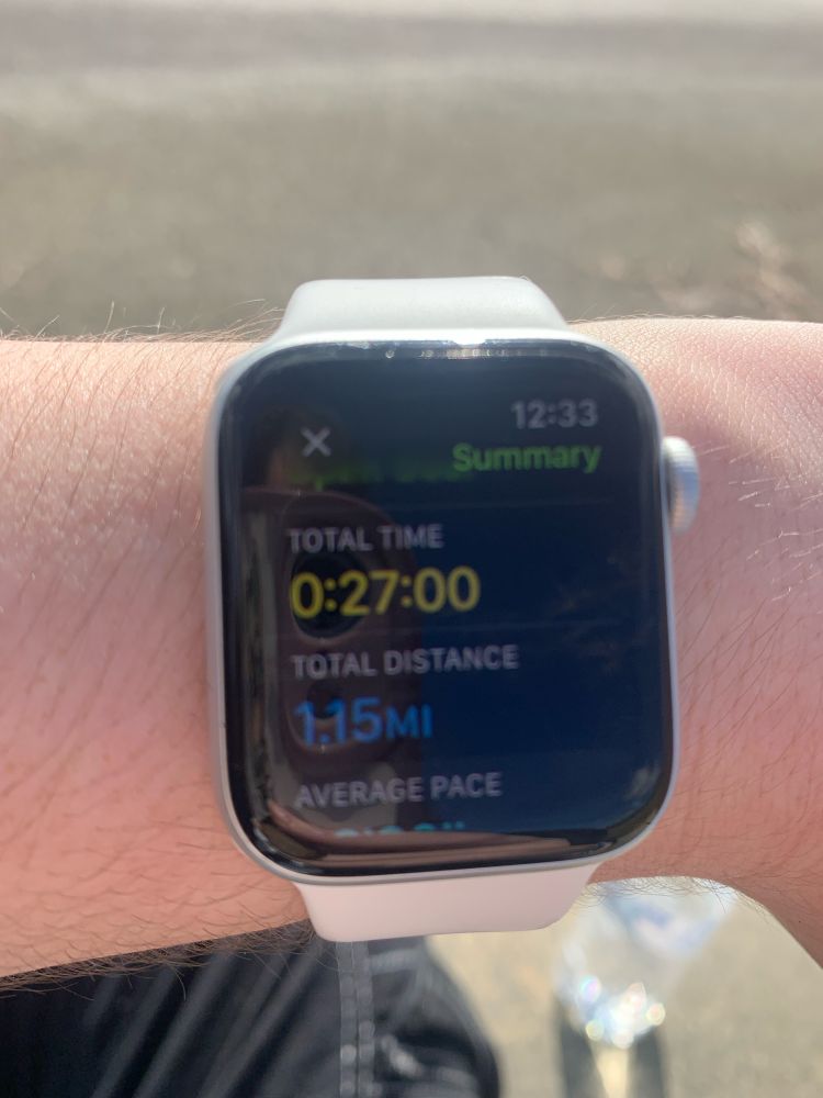 Photo of an Apple watch showing the summary of a walk with the total time of 27 minutes and a total distance of 1.15 miles.