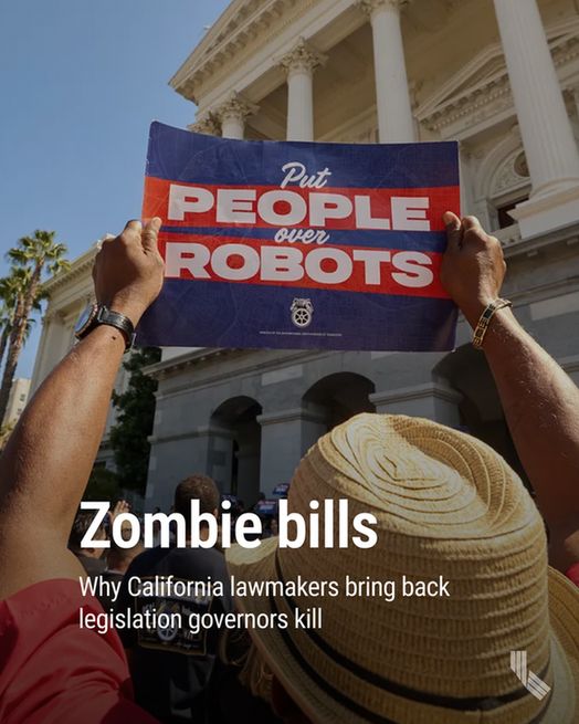 A protester holds a sign on the steps of the state Capitol calling on Gov. Gavin Newsom to sign a bill that would require a human operator in all autonomous vehicles in Sacramento on Sept. 19, 2023. Photo by Fred Greaves for CalMatters

Hed: Zombie Bills: Why California lawmakers bring back legislation governors kill

