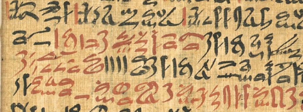 Picture of a papyrus with demotic script in red and black