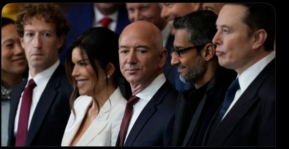 An image of Elon Musk, Jeff Bezos, Mark Zuckerberg and two other billionaire parasites in a crowd of what I can only assume is other billionaire social pariahs.