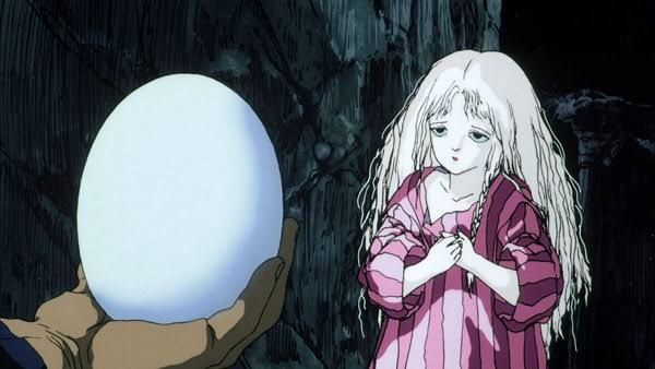 The boy, off screen hands the girl her egg.