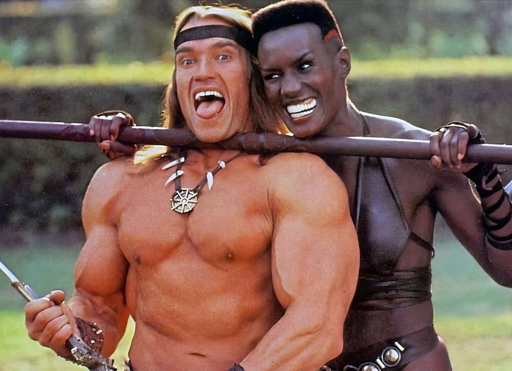 Arnold Schwarzenegger and Grace Jones on set of Conan the Destroyer 