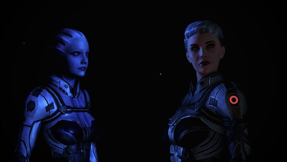 Liara and Shepard looking off at a dark horizon.