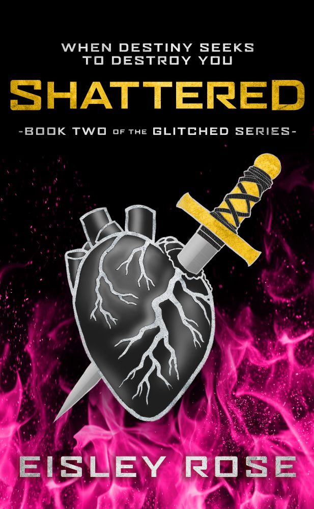 Book cover for Shattered by Eisley Rose, the second installment in The Glitched Series. The design features a dark, metallic anatomical heart with jagged cracks running through it, pierced by a dagger with a gold and black hilt. The background is deep black with vivid pink flames rising from the bottom. The title Shattered is displayed in bold, distressed gold lettering, with the tagline "When destiny seeks to destroy you" above it in white text. The author's name appears at the bottom in a metallic silver font. 