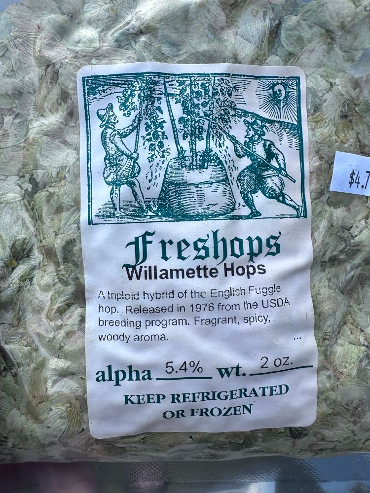 A very medieval image of hops being harvested on a package of hops