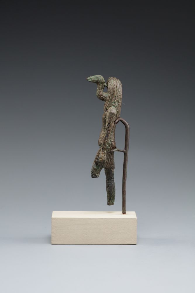 Statuette of Thoth with an ibis coming out of his face.