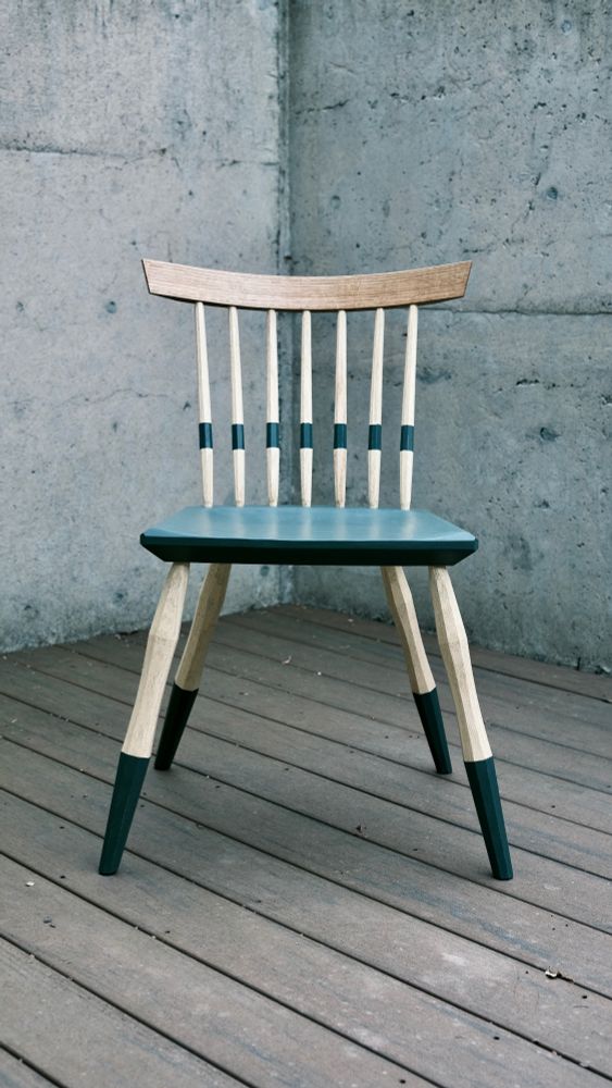 Front on view of a side chair with milk paint accents