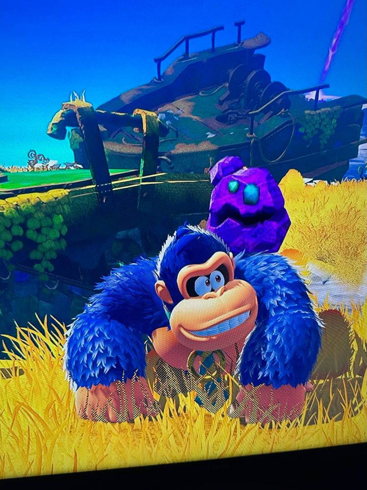 Donkey Kong from Donkey Kong Bonanza with blue fur and a blue and yellow striped tie.