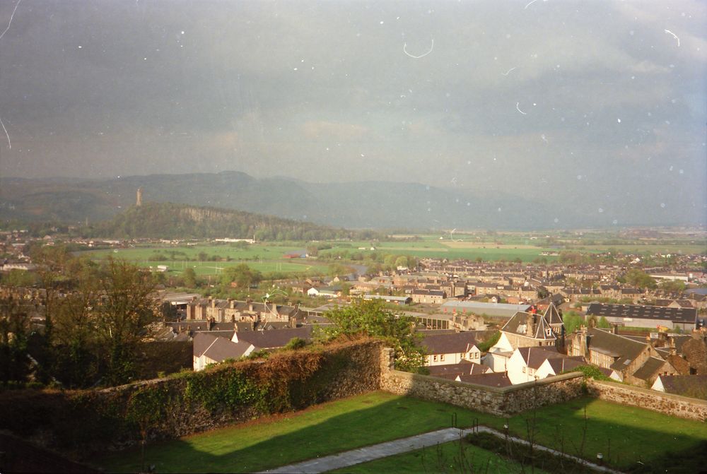 Image from Stirling Castle, rest of town in foreground, Wallace memorial and start of Highlands in the background.