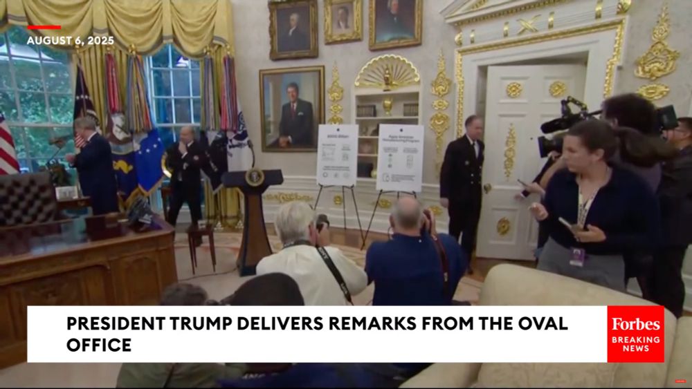 Screenshot from a video of a press event in the Oval Office earlier today showing roughly a quarter of the south side of the Oval Office, with hardly a surface in sight that doesn't have something gold on it. Secretary of the Treasury Scott Bessent and Secretary of Commerce Howard Lutnick are standing and waiting for Trump to arrive at left center, behind the Resolute Desk. Source: https://www.youtube.com/watch?v=2mrUGOSEMGc