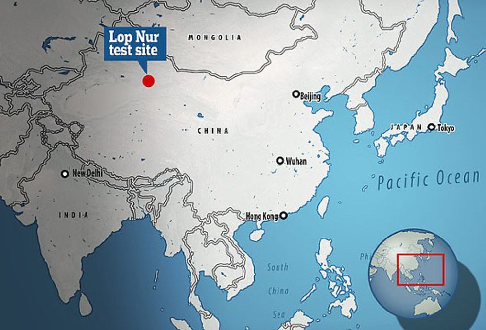 A color map showing the location of the Lop Nor nuclear test site in Xinjiang Province in northwestern China, south of Mongolia. An inset map of the Earth shows the region's location relative to Russia, Indonesia, Australia, and the Pacific and Indian oceans.