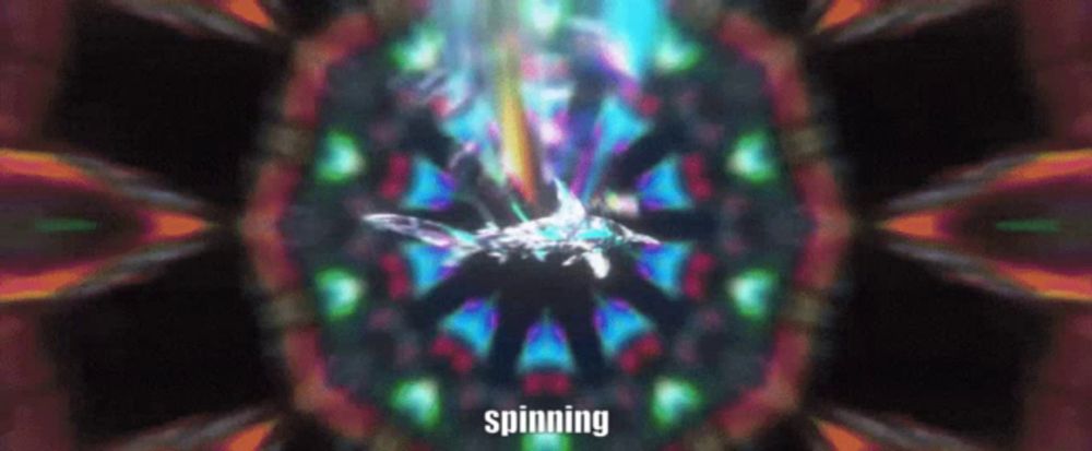 a colorful kaleidoscope with the word spinning in the middle