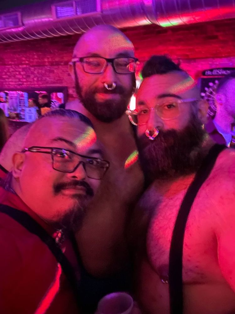Kunai, Deimos, and NinjaAdobo in bisexual mood lighting at a gay bar