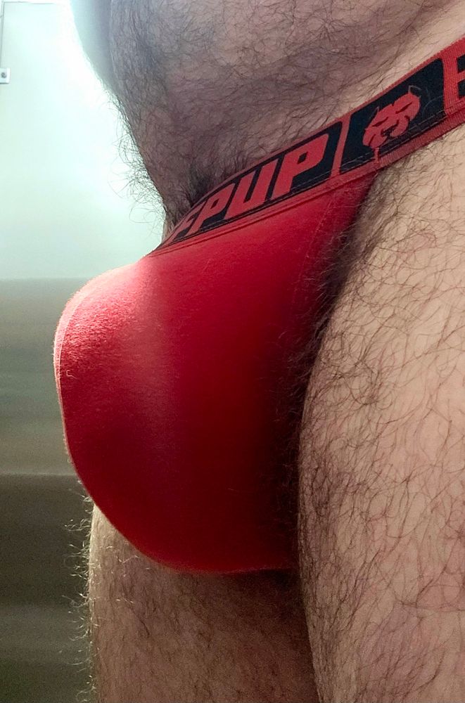 Large bulge in a red GruffPup jock