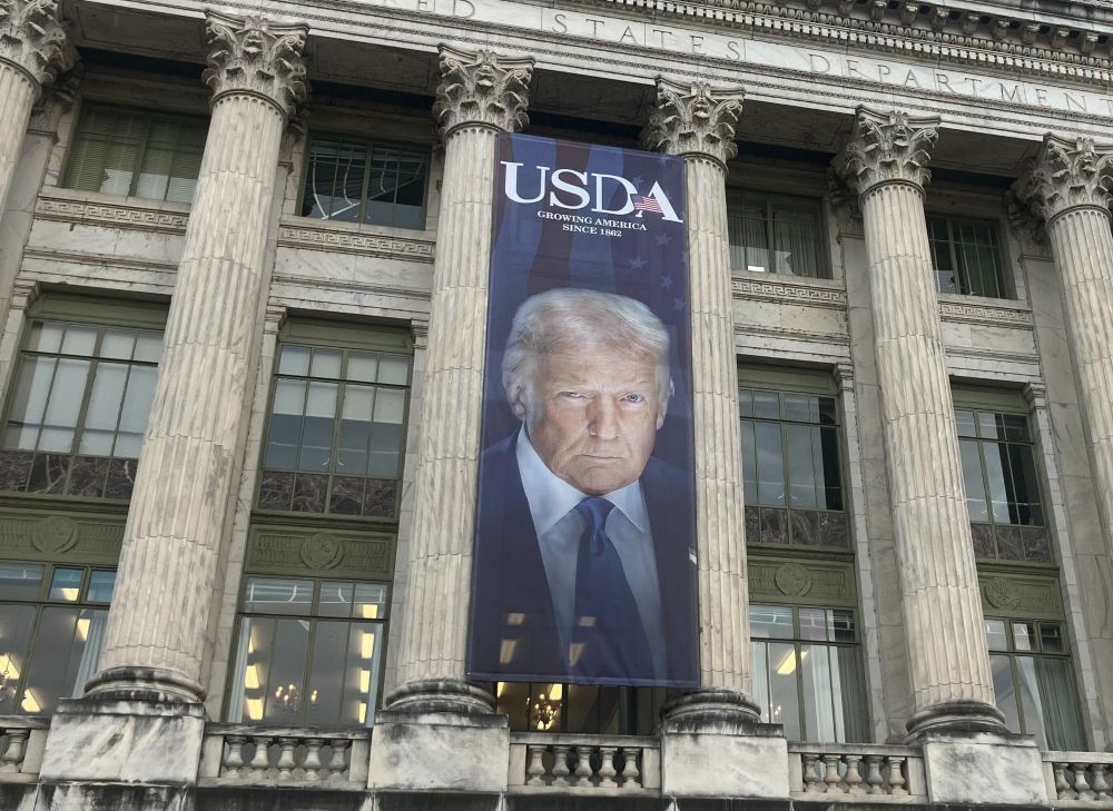 Gigantic poster with Trump face hanging on USDA building