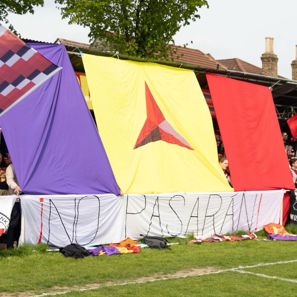 Tifo before the game with 'no pasaran' and the Spanish Republic flag 