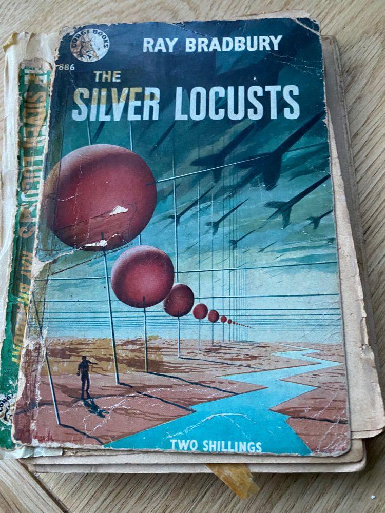 Cover of the Silver Locusts by Ray Bradbury. Very old copy, all tatty and held together with sellotape.