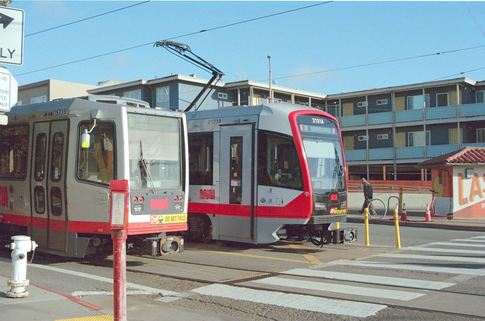 A Muni Breda LRV3 and Siemens LRV4 at Ocean Beach.

Nikon N80 - Kodak Ultramax 400
