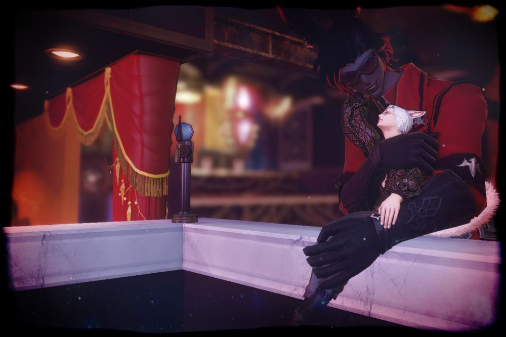 A white haired miqo'te man is hugged from behind by a rather large rava viera.