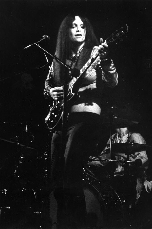 April Lawton playing guitar
