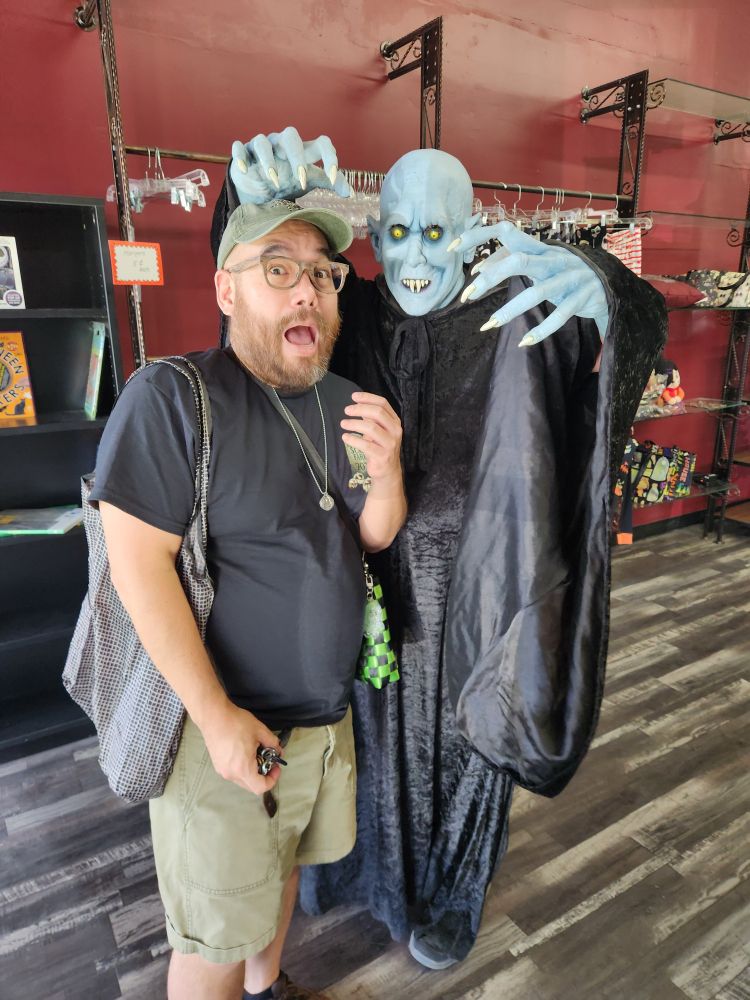 Photo op with Barlow the vampire from Salem's Lot. Costumes characters were also a feature of the closing of Dark Delicacies book shop.