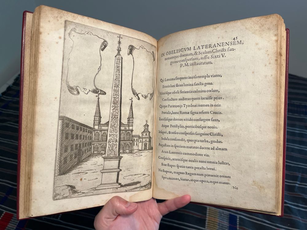 Opening of a book printed in 1588 celebrating Pope Sixtus V’s architectural achievements. Copperplate print on the let shows the Lateran Obelisk. On the right is a letterpress poem in Neo-Latin about it.