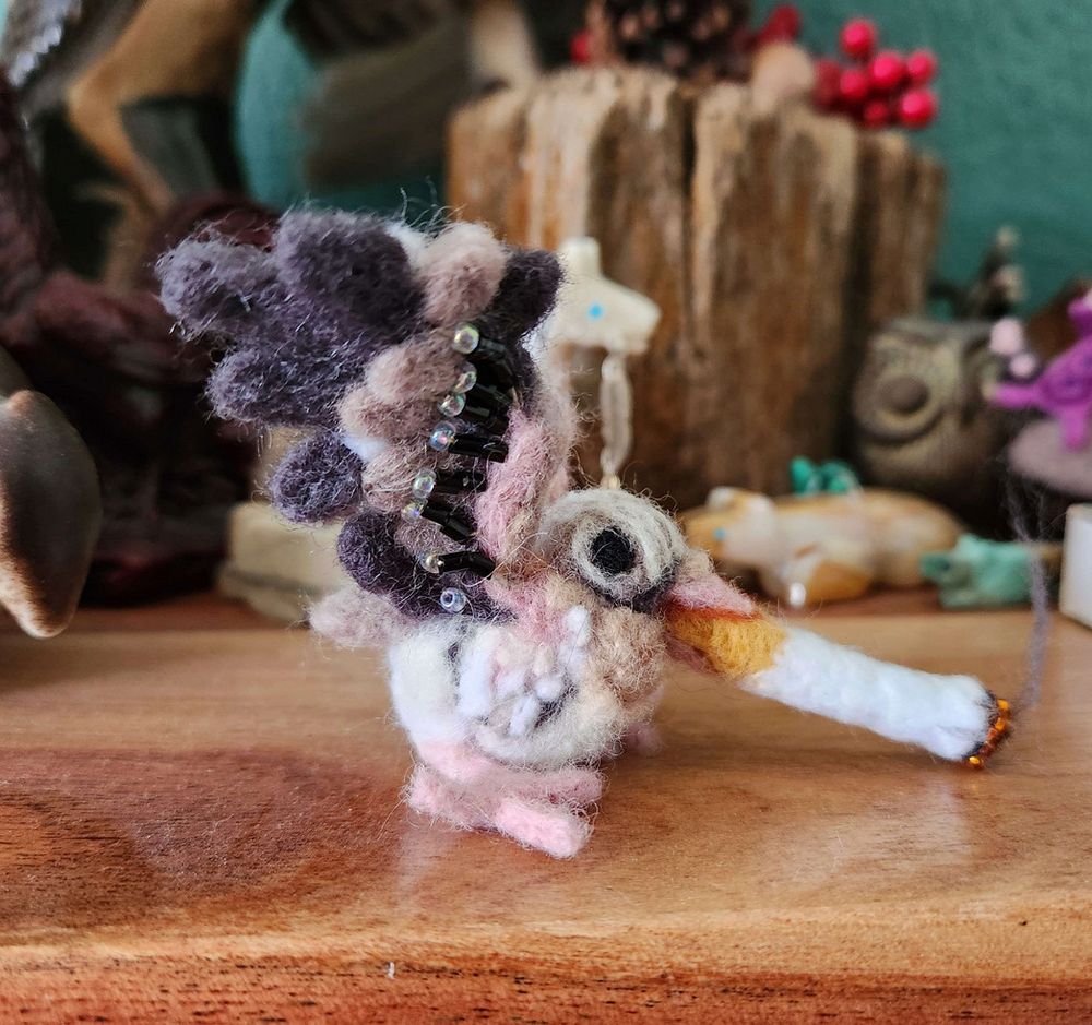 Needlefelted squab with cigarette