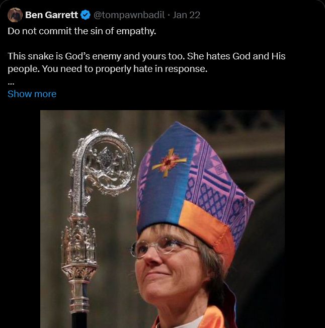 This is a screenshot from the other site that shows an image of Bishop Budde. The text, from an account named Ben Garrett, reads:

Do not commit the sin of empathy. This snake is God's enemy and your too. She hates God and His people. You need to properly hate in response.