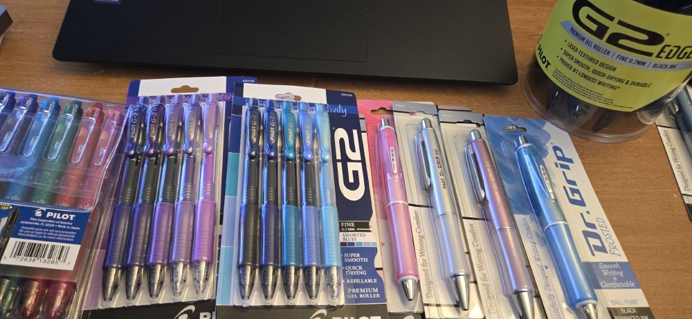 Frixion Clicker pens, G2 pens, and Dr. Grip pens. All in assorted colors.