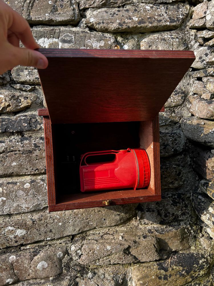 Box with a torch