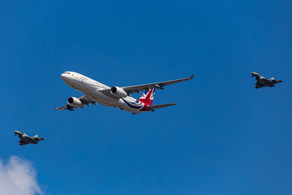 A330 “Voyager” in British VIP Livery with 2 Eurofighter Typhoons on each wing in blue skies 