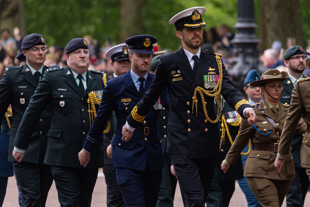 Commonwealth Armed Forces parading along the Mall.