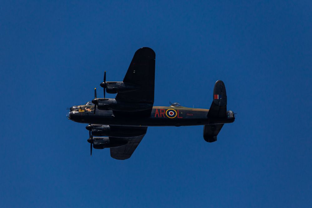 Afro Lancaster Bomber - Battle of Britain Memorial Flight flying in blue skies