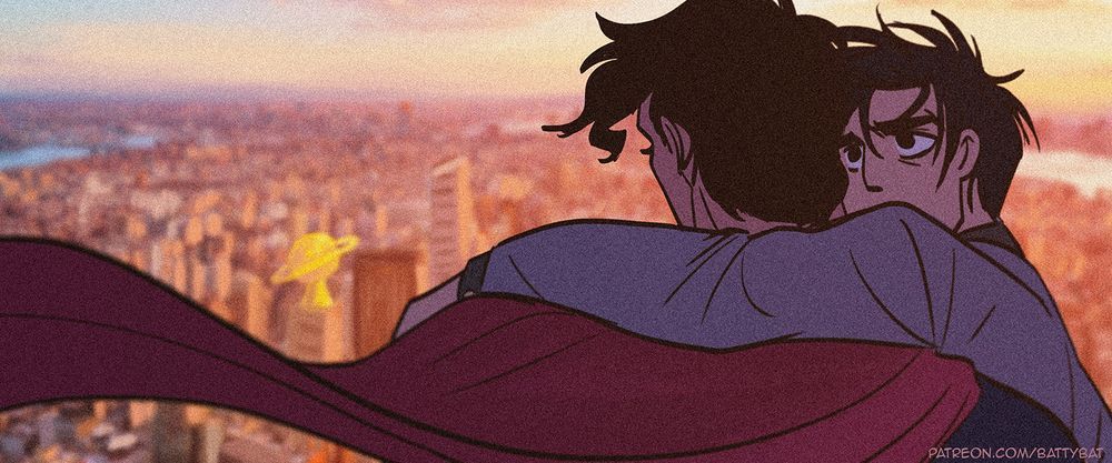 Bruce looks longingly at Superman as Superman floats them over Metropolis, the Daily Planet gleaming gold in the setting sun.