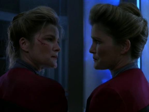 Star Trek: Voyager screenshot of Captain Janeway looking at a double of herself with the sort of intensity that most people give when they want to fuck nasty style, for some reason.