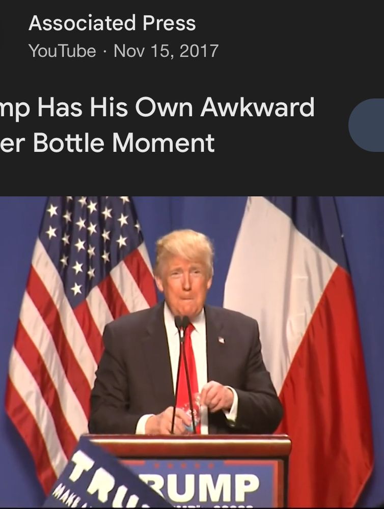 Trump demonstrating that he can drink with a water bottle with one hand, dated November 15, 2017. He does not appear to be wearing a wedding ring.