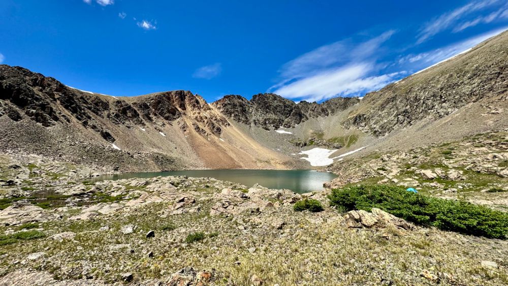 pano photo taken from the edge of a high alpine lake in montezuma, co. 