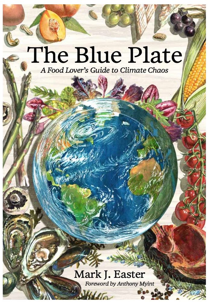 The image is a book cover titled "The Blue Plate: A Food Lover's Guide to Climate Chaos" by Mark J. Easter, with a foreword by Anthony Myint. The central element is an illustration of Earth, depicted as a globe surrounded by various food items. 

At the top left, there is a halved peach with a visible pit, accompanied by cashew nuts. To the right, there are grapes and a wedge of cheese. Below the title, a variety of vegetables and fruits encircle the globe. On the left side, asparagus spears and mushrooms are visible. On the right side, there is a corn cob and a cluster of tomatoes on the vine. Below the globe, oysters and a cut of meat are depicted, along with leafy greens and herbs. The arrangement of these elements creates a circular pattern around the globe, emphasizing the theme of food and its connection to the planet.