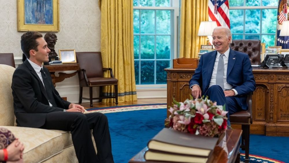 FBI offspring David Hogg and Joe Biden sitting in the Oval Office grinning like idiots.