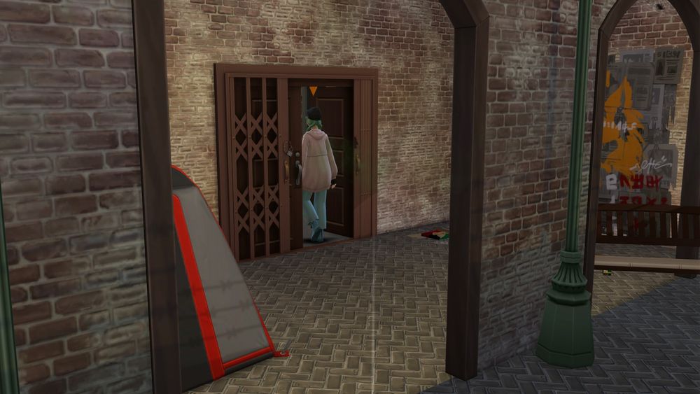 Sarah going into the building. This is a different place already, Sarah has passed some arches and is going through a wooden door. Lots of bricks on the walls and floor, a piece of a tent can be seen behind one of the arches. There’s a metal pole, likely from a lamp, in a green colour and some newspapers glued to a wall. Some trash and an out of place bench can also be seen.