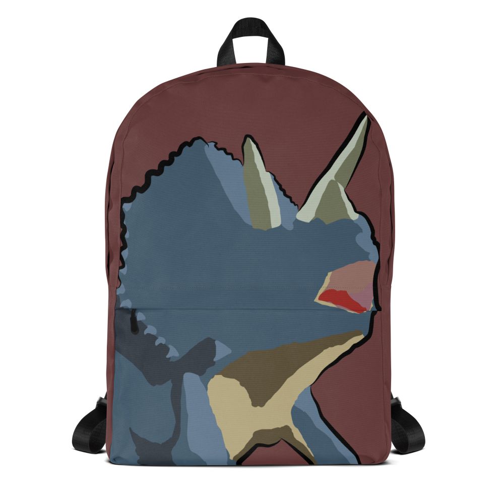 A red backpack featuring a triceratops design