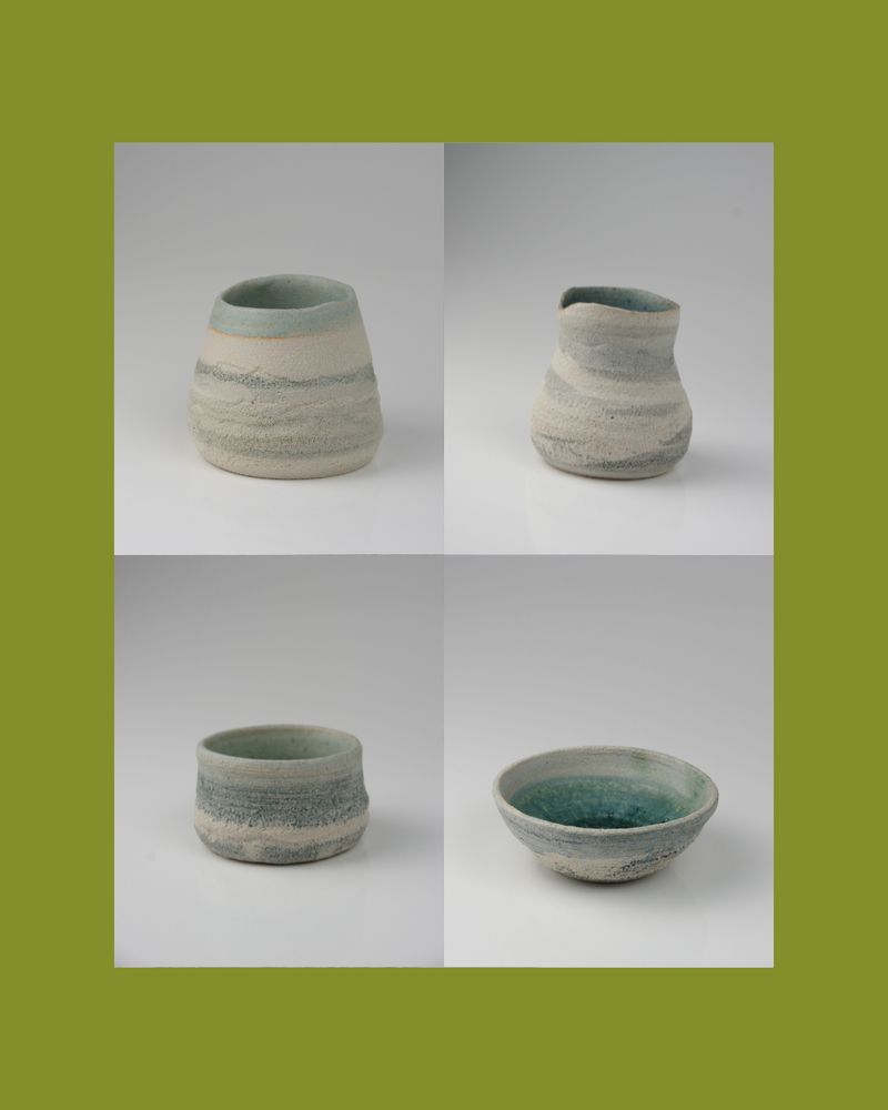 A boat of 4 arctic inspired pots.