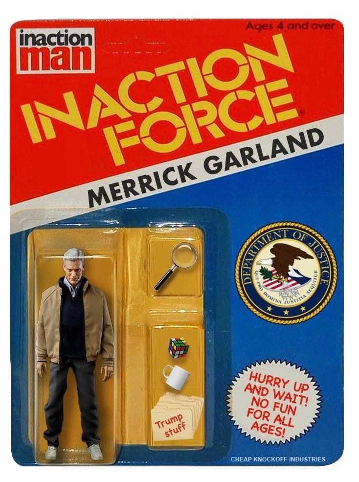 A figurine toy in its box that says “Inaction Man. Inaction force: Merrick Garland