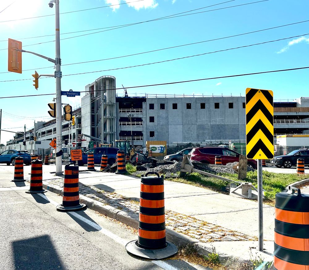 Photo: 
The mostly finished parking garage at the corner of Dow’s Lake and Preston Street, a huge, brutally concrete, four-level structure with absolutely no redeeming design elements. 