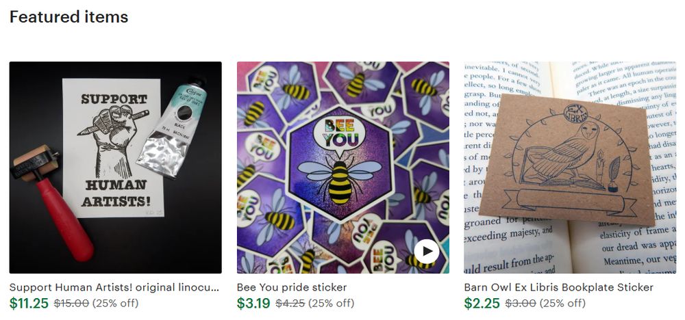 A screenshot of three featured items from the EvergreenPhoenix Etsy shop. On the left is a "Support Human Artists!" linocut print. In the middle is a "Bee You" pride sticker featuring a bee. On the right is the brown kraft paper ex libris sticker, featuring a barn owl on a book. 