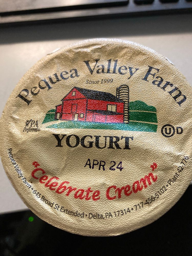 Yogurt lid that reads “celebrate cream.”